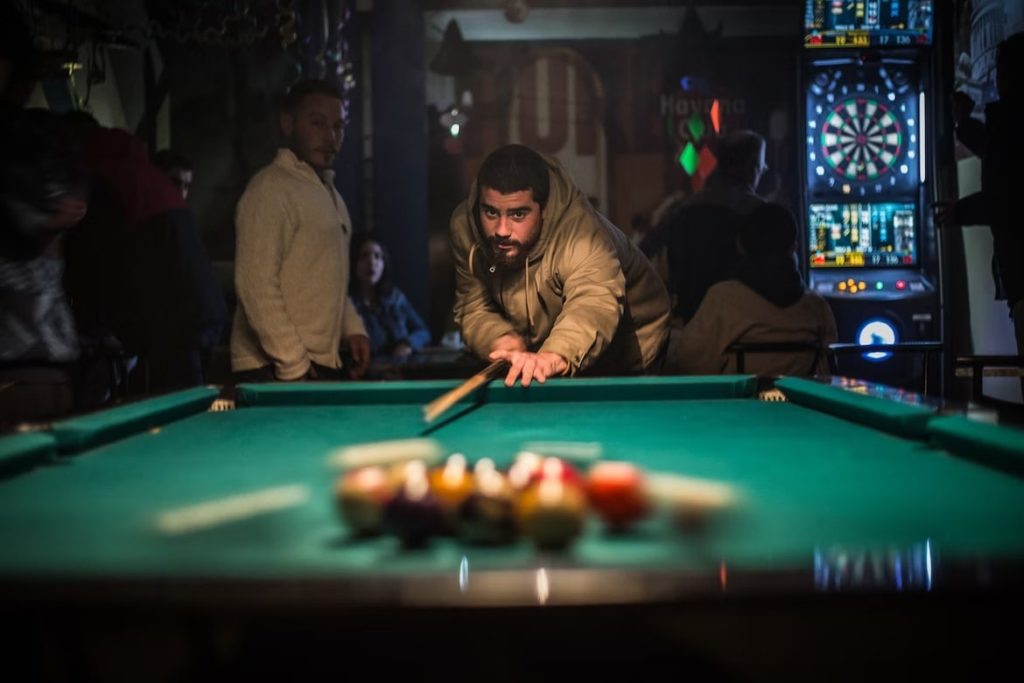 Pub games like darts, pool, and trivia provide entertainment